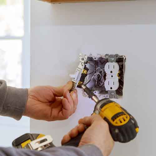 Image of electrical outlet installation.